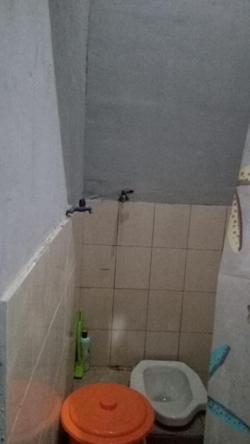 Kost Backpacker Hotell Sidoarjo Exteriör bild
